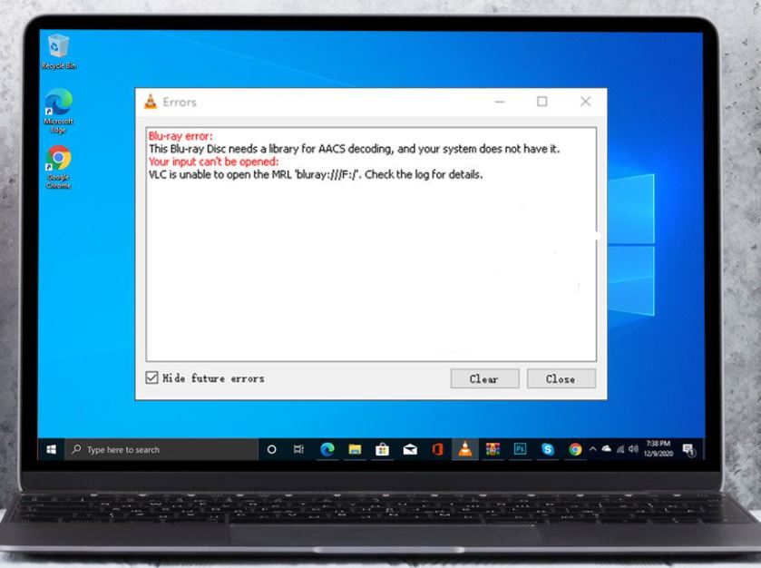 What is the cause of the "This Blu-ray Disc requires an AACS decoding library" error